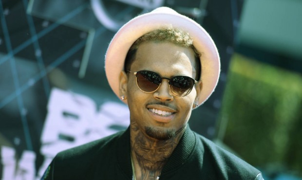 FILE – In this June 28, 2015 file photo, Chris Brown arrives at the BET Awards at the Microso...