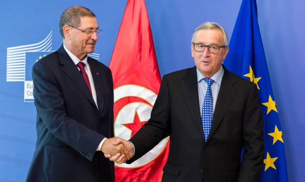 European Commission President Jean-Claude Juncker, right, welcomes Tunisia’s Prime Minister H...