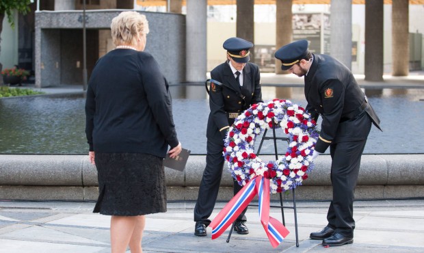 Norwegian Prime Minister, Erna Solberg, takes part in a wreath laying at a memorial ceremony taking...