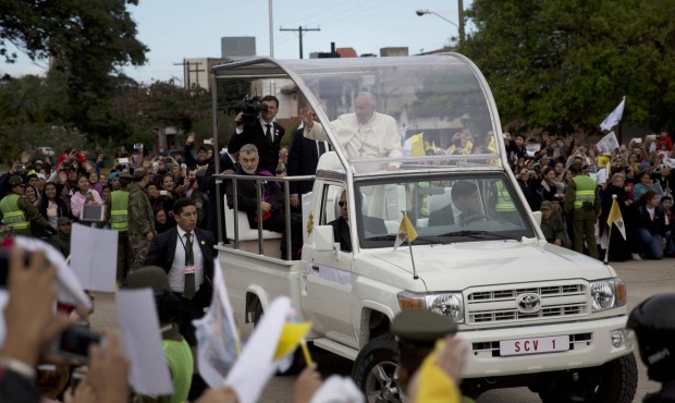 Pope Francis greets the crowd in Santa Cruz, Bolivia, Thursday, July 9, 2015. The pope is heading t...