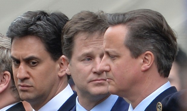 Labour Party leader Ed Miliband, left, Liberal Democrat leader Nick Clegg, centre, and Prime Minist...
