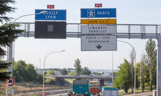 Farmers barricade the highway leading Paris to Lyon in Limonest near Lyon, central France, Thursday...