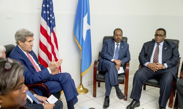 US Secretary of State John Kerry, left, meets with President Hassan Sheikh Mohammed, second from ri...