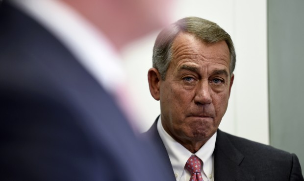 House Speaker John Boehner of Ohio listens during a news conference on Capitol Hill in Washington, ...
