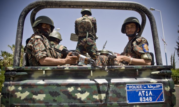 Shiite fighters, known as Houthis, wearing army uniforms escort the convoy of Ismail Weld al-Sheikh...