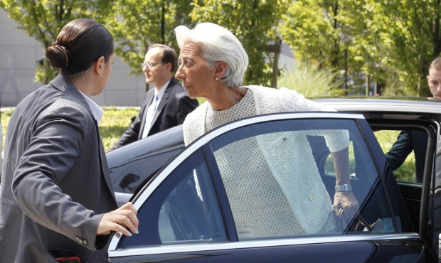 Managing Director of the International Monetary Fund Christine Lagarde, center, arrives for a meeti...