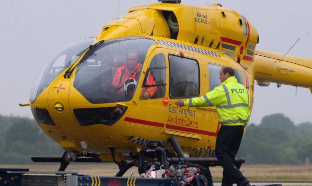 Britain’s Prince William, the Duke of Cambridge prepares to board an East Anglian Air Ambulan...