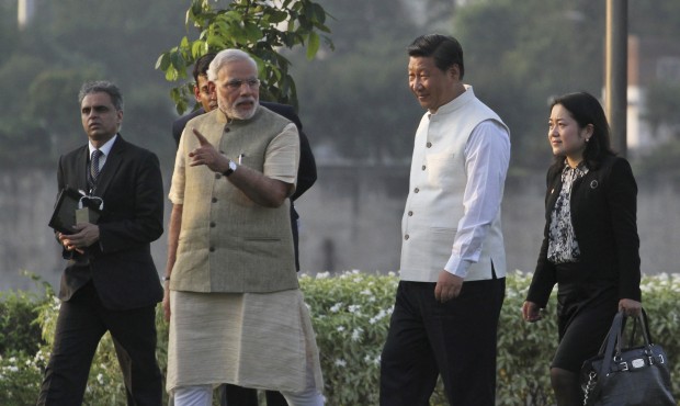 FILE – In this Sept. 17, 2014 file photo, Indian Prime Minister Narendra Modi, second from le...