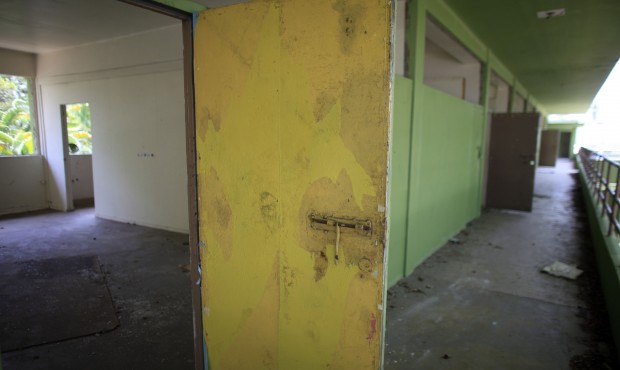 FILE – This May 7, 2015 file photo shows a hallway in the closed Francisco Oller Elementary S...
