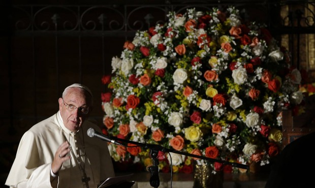 Pope Francis delivers his message during his visit to the San Francisco Church in Quito, Ecuador, T...