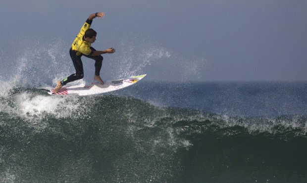 Brazil’s Adriano de Souza competes in the 2015 Oi Rio Pro World Surf League competition at Ba...