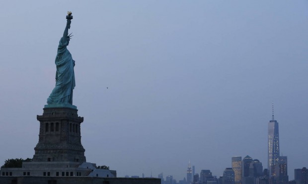 FILE – In this Tuesday, July 7, 2015, file photo, the Statue of Liberty stands in New York ha...