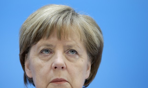 German Chancellor Angela Merkel attends a press conference in Berlin, Germany, Monday, May 11, 2015...