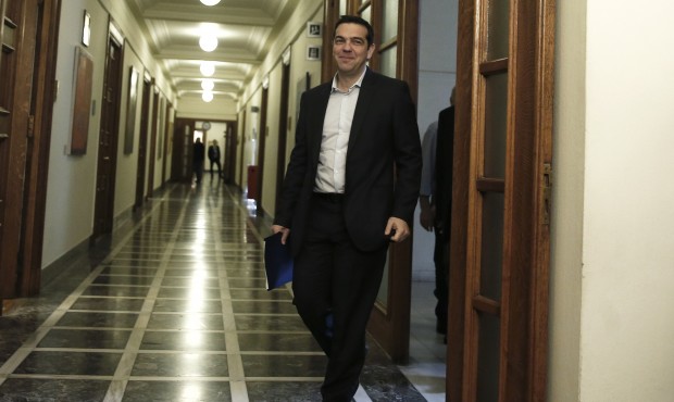 Greek Prime Minister Alexis Tsipras arrives at a cabinet meeting in central Athens, on Tuesday, May...
