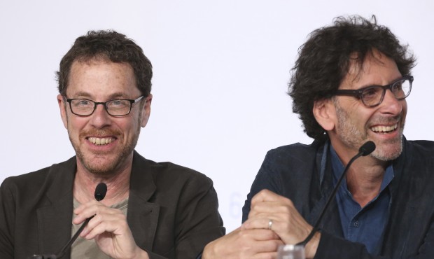 Jury presidents Ethan Coen, left, and Joel Coen laugh during a press conference for the jury at the...