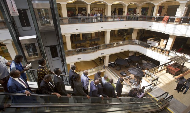 Kenyan dignitaries take a tour of the Westgate Mall, during a viewing for the media prior to it bei...