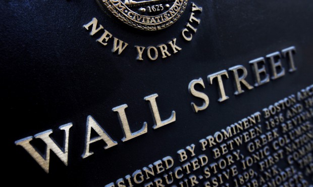 FILE – This Jan. 4, 2010 file photo shows an historic marker on Wall Street in New York. U.S....