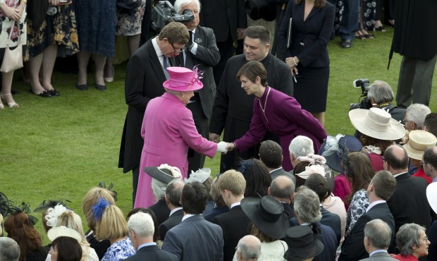Britain’s Queen Elizabeth II, centre left greets Libby Lane, the Bishop of Stockport, who is ...