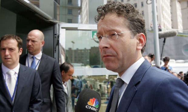 Dutch Finance Minister and chair of the eurogroup Jeroen Dijsselbloem speaks with the media as he a...