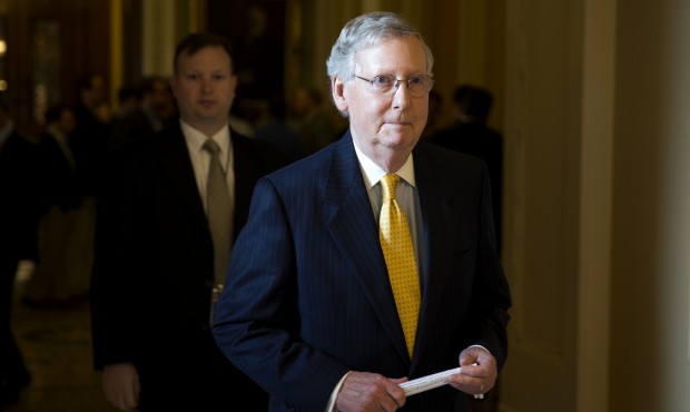 In this May 5, 2015, file photo, Senate Majority Leader Sen. Mitch McConnell of Ky. walks to his of...