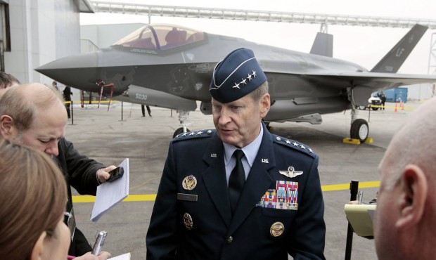 FILE – In this Dec. 13, 2013 file photo, Gen. Robin Rand, of Randolph Air Force Base, talks w...