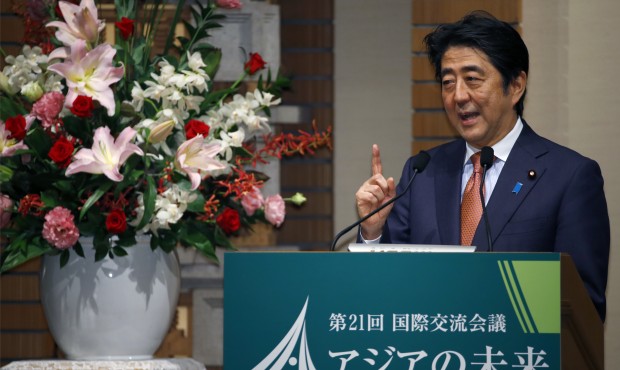Japanese Prime Minister Shinzo Abe speaks during a banquet of a symposium on the “Future of A...