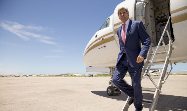 U.S. Secretary of State John Kerry arrives at the airport in Mogadishu, Somalia Tuesday, May 5, 201...
