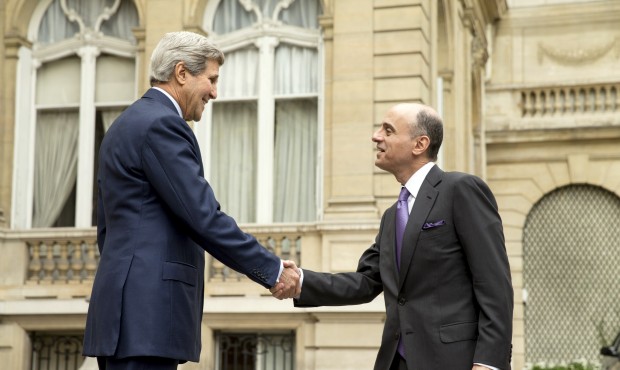 In this May 8, 2015, photo, Secretary of State John Kerry shakes hands with Saudi Foreign Minister ...