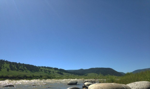 This June 13, 2015 photo shows the Gallatin River near Big Sky, Montana, about 50 miles from Yellow...