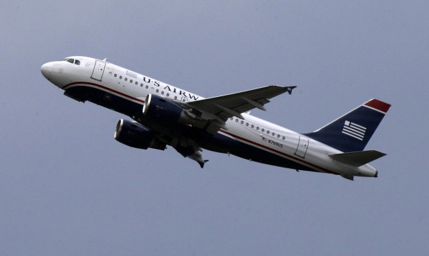 FILE – In this July 23, 2013, file photo, a US Airways jet takes off from Pittsburgh Internat...