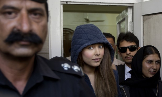 Pakistan’s top model, Ayaan Ayaan Ali, center, leaves a court in Rawalpindi, Pakistan, Monday...