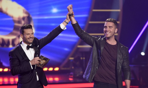 Ryan Seacrest, left, announces Nick Fradiani the winner at the American Idol XIV finale at the Dolb...