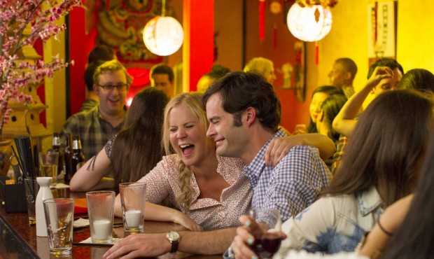 This photo provided by Universal Pictures shows, Amy Schumer , left, as Amy, and Bill Hader as Aaro...