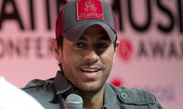 FILE – In this April 23, 2014 file photo, Enrique Iglesias talks about his music during a Bil...