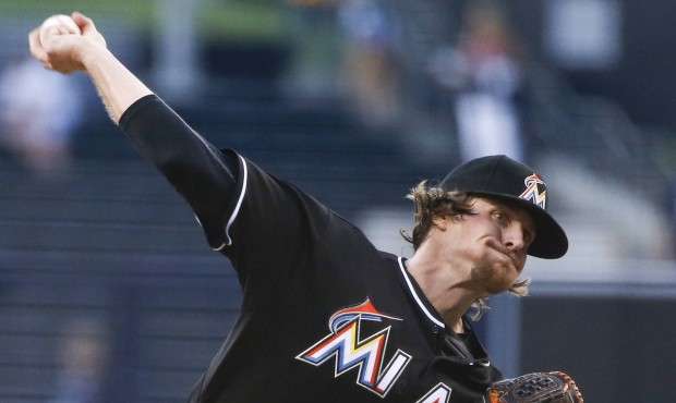 Miami Marlins starting pitcher Tom Koehler throws to a San Diego Padres batter during the first inn...