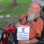 Glenn Johnson, 56, holds up a flier about 5-year-old Arizona girl Jahessye Shockley, Thursday, Oct. 20, 2011 in Phoenix. Jahessye has been missing for more than a week, and Johnson is among friends and neighbors of her family who have helped search for her and pass out fliers. (AP Photo/Amanda Myers)