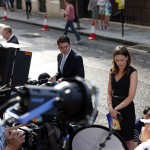 Members of broadcast media give live reports across from St. Mary's Hospital exclusive Lindo Wing in London, Monday, July 22, 2013. Buckingham Palace officials say Prince William's wife, Kate, has been admitted to the hospital in the early stages of labour. Royal officials said that Kate traveled by car to St. Mary's Hospital in central London. Kate _ also known as the Duchess of Cambridge _ is expected to give birth in the private Lindo Wing of the hospital, where Princess Diana gave birth to William and his younger brother, Prince Harry.The baby will be third in line for the British throne _ behind Prince Charles and William _ and is anticipated eventually to become king or queen. (AP Photo/Lefteris Pitarakis)