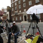 Journalists prepare at the entrance to the Lindo Wing at St Mary's Hospital in London, Tuesday, July 2, 2013. Media are preparing for royal-mania as Britain's Duchess of Cambridge plans to give birth to the new third-in-line to the throne in mid-July, at the Lindo Wing. Cameras from all over the world are set to be jostling outside for an exclusive first glimpse of Britain's Prince William and the Duchess of Cambridge's first child. (AP Photo/Frank Augstein)