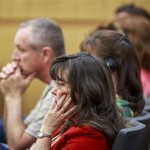 Jodi Arias' family members listen as Jodi talks about her relationship with Travis Alexander as she testifies in her murder trial in Judge Sherry Stephens' Superior Court, on Wednesday, Feb. 6, 2013. Arias, 32, is accused of stabbing and slashing Alexander, 27 times, slitting his throat and shooting him in the head in his suburban Phoenix home in June 2008. She initially denied any involvement, then later blamed it on masked intruders before eventually settling on self-defense. (AP Photo/The Arizona Republic, Charlie Leight)
