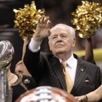 New Orleans Saints owner Tom Benson waves to fans during ceremonies before the Saints' NFL football season opener against the Minnesota Vikings at the Louisiana Superdome in New Orleans on Thursday, Sept. 9, 2010. (AP Photo/Dave Martin)