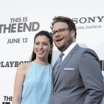 Actor Seth Rogen, right, and his wife, Lauren Miller arrive at the world premiere of "This is the End" at the Regency Village Theater on Monday, June 3, 2013 in Los Angeles. (Photo by Dan Steinberg/Invision/AP)