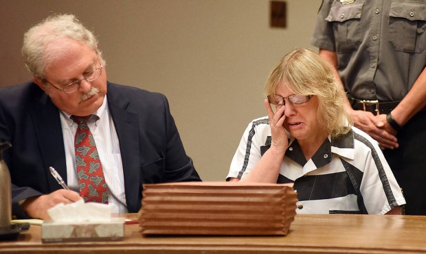 Joyce Mitchell cries as she sits with her attorney Stephen Johnston in court on Tuesday July 28, 20...