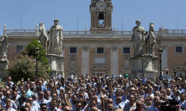 n Public transport workers raise their hands during a protest at Campidoglio Capitol Hill square in...