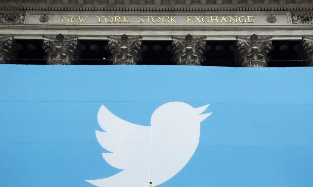 n File – In this Nov. 7, 2013, file photo, a Twitter sign is draped on the facade of the New ...